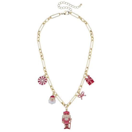 The gold-tone charm necklace featuring a nutcracker, Santa, and other festive enamel charms.