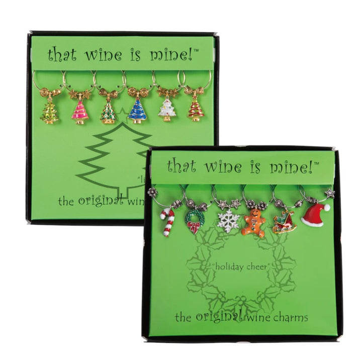 Two sets of Christmas-themed wine charms in green packaging with 'that wine is mine!' text.