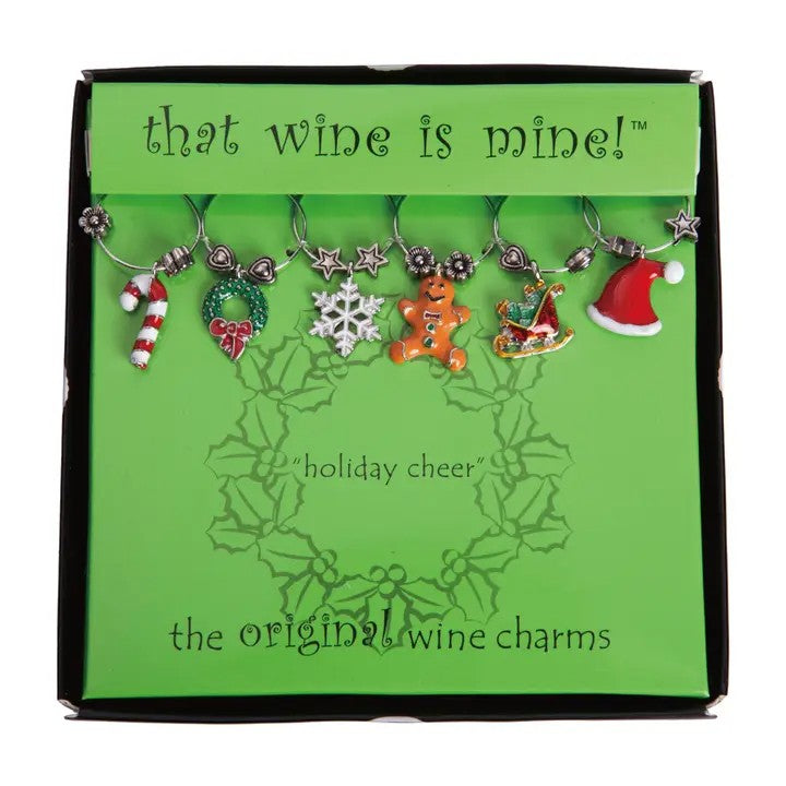 The boxed set of 6 Holiday Cheer wine charms, including a candy cane, wreath, and snowflake, on a white background.