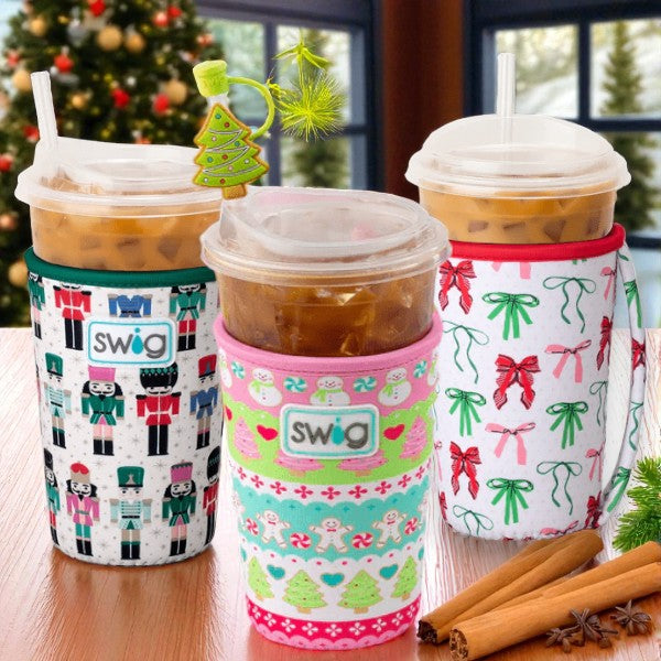 Collection of Swig holiday cup coozies in Ribbons & Bows, Classic Nutcracker, and Cookie Jar.