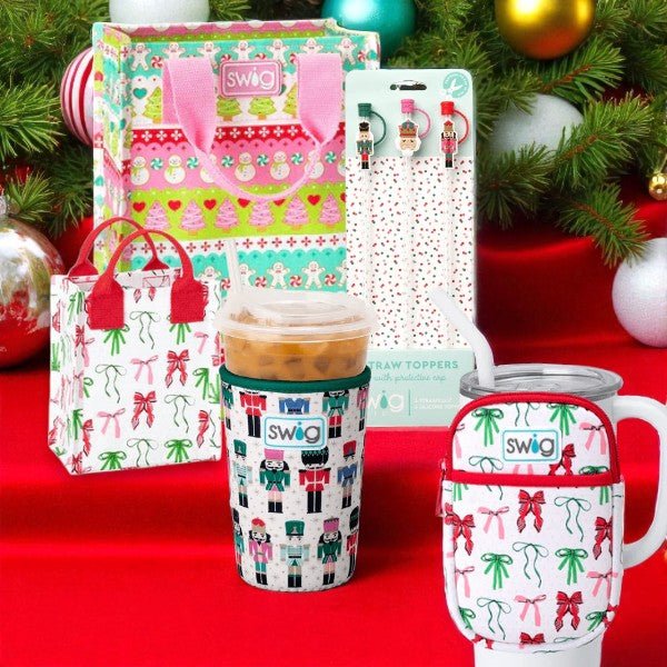Collage of Swig holiday accessories in Ribbons & Bows, Classic Nutcracker, and Cookie Jar prints, including cup coozies, 40oz Mega Mug pouch, straw topper sets, and tall and mini reusable gift bags.