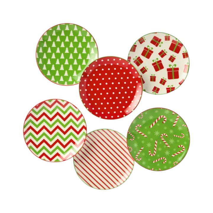 Set of six Christmas-themed plates with various patterns on a white background