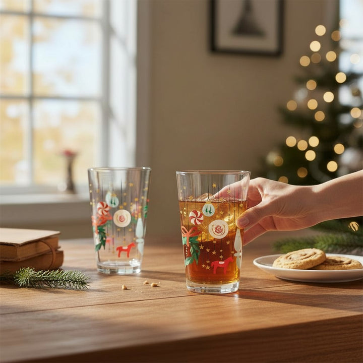A lifestyle scene of someone enjoying a beverage from the Churchill Downs pint glass at a holiday party.
