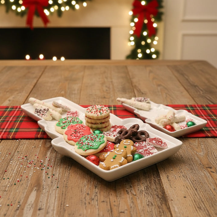 A holiday table styled with the Nutcracker dishes, filled with festive treats.