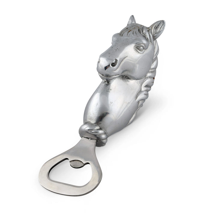 Silver horse-shaped bottle opener on a white background