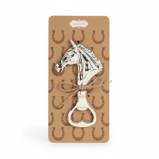 Horse-shaped bottle opener on a cardboard backing with horse shoe pattern