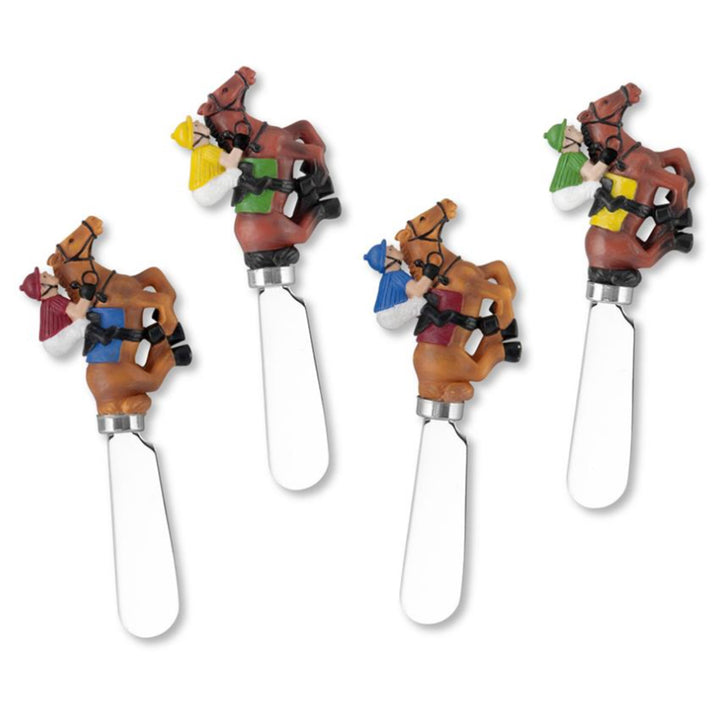 Four cheese Spreaders with horse and rider design on a white background