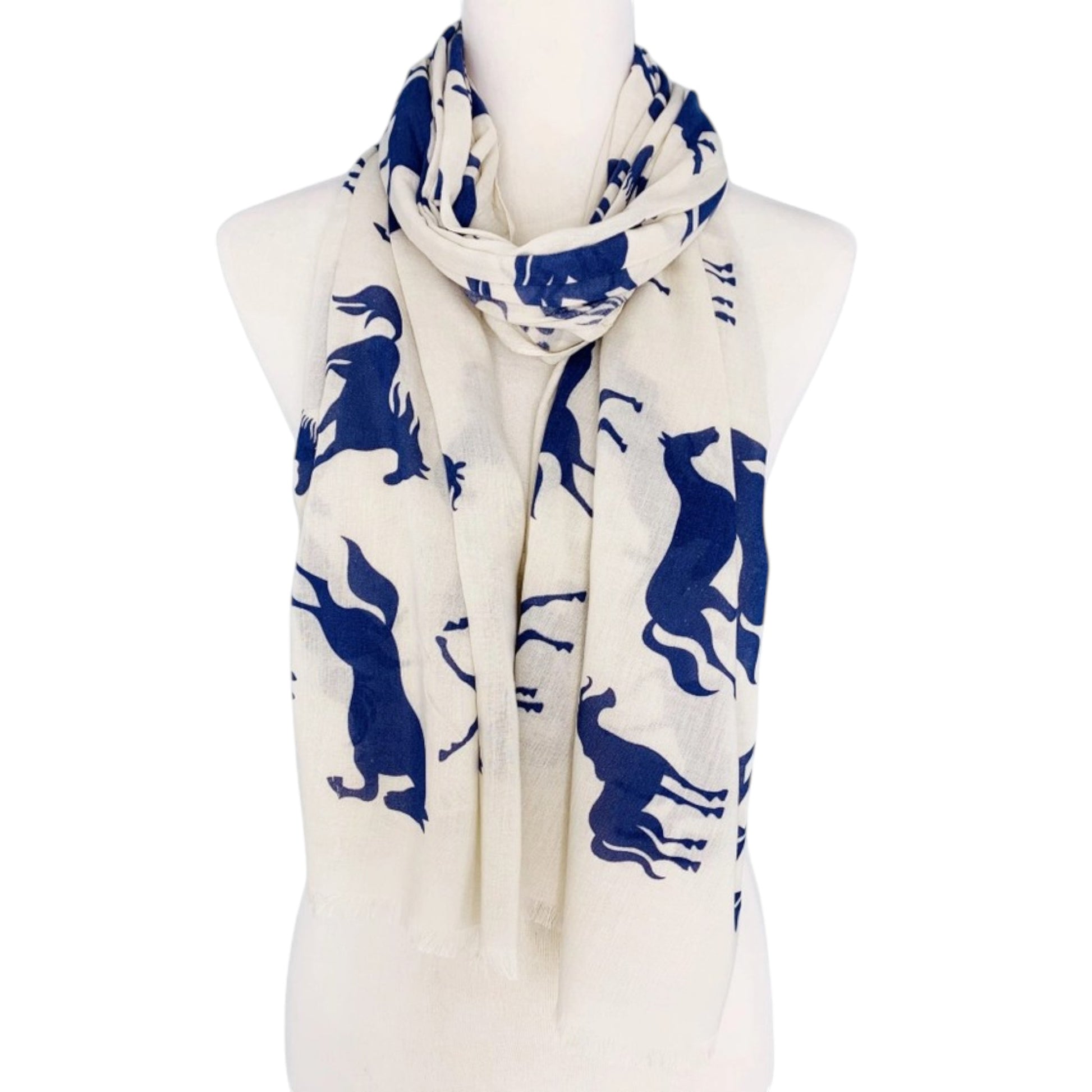 White scarf with blue horse patterns on a mannequin against a white background