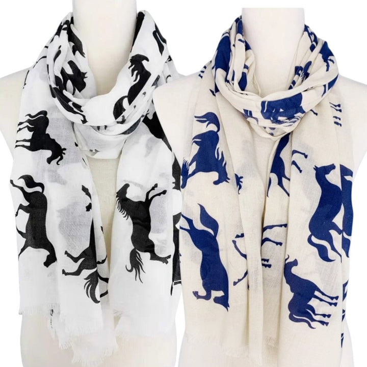 Two scarves with horse patterns on mannequins against a white background