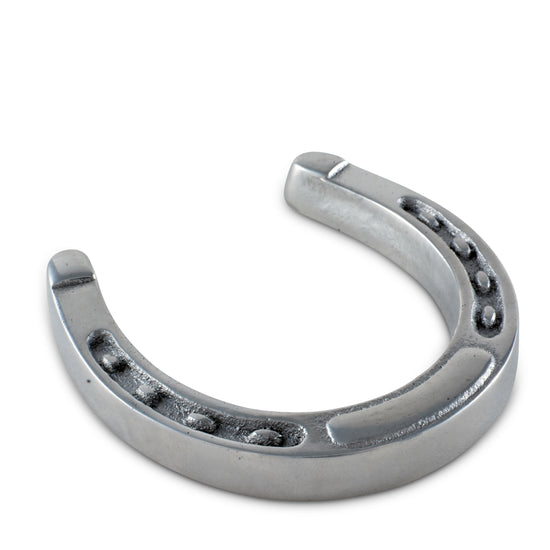 Metallic horseshoe on a white background