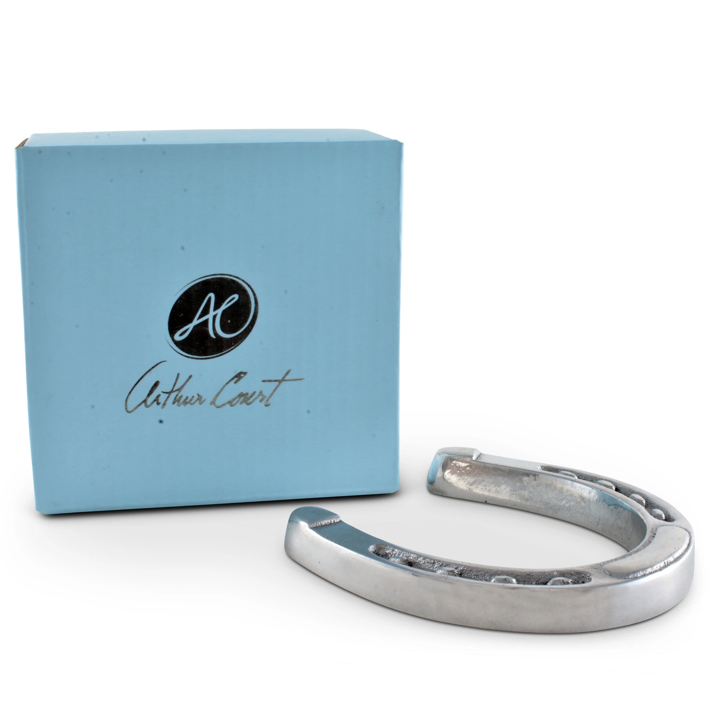 Silver horseshoe with a blue box featuring 'Arthur Court' branding on a white background