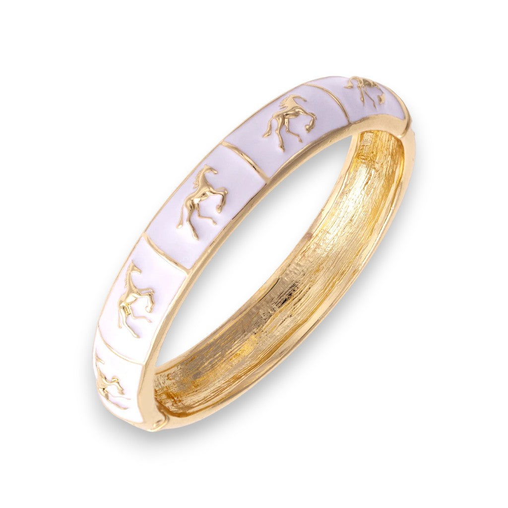 Close-up of the Horsin' Around Bangle in white enamel.