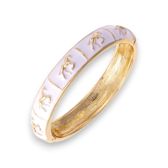Close-up of the Horsin' Around Bangle in white enamel.