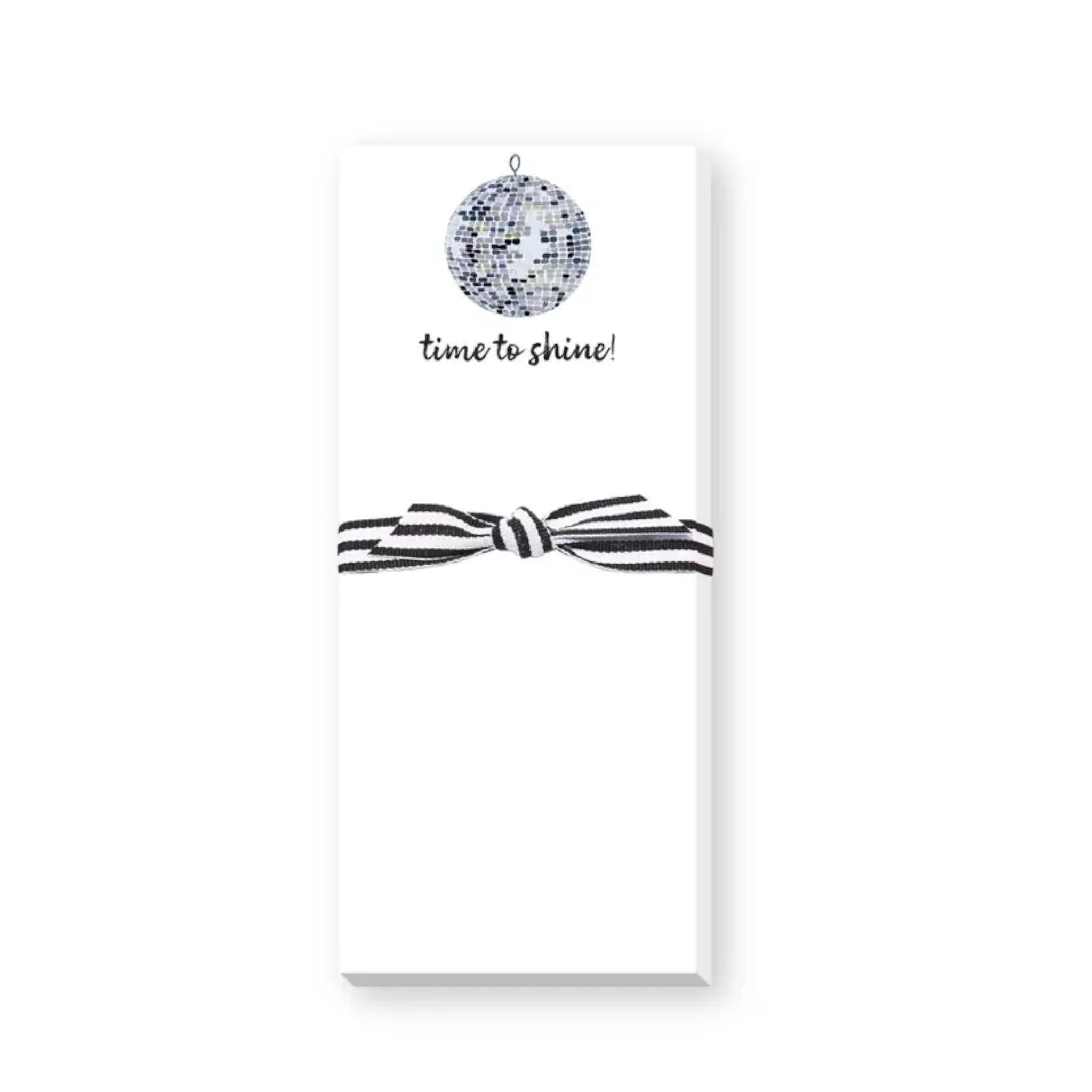 Notebook with a disco ball and bow design on a white background