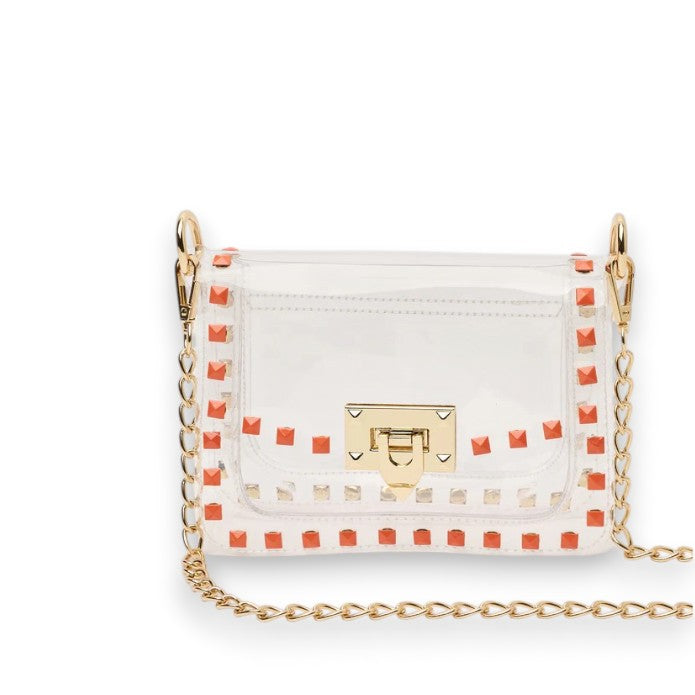 The Jackie clear crossbody purse showcasing its vibrant orange trim and sleek, structured design.