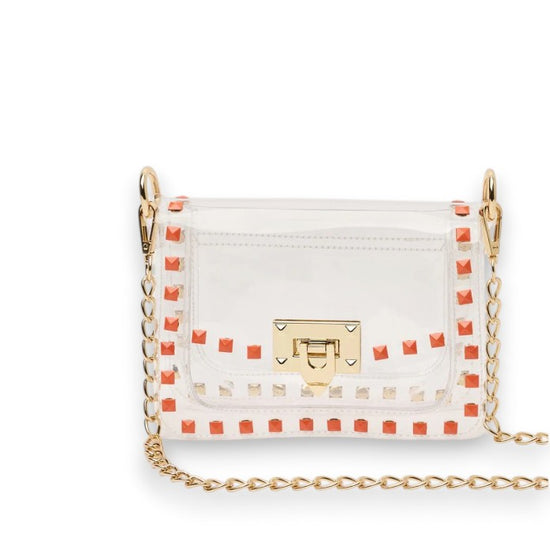 The Jackie clear crossbody purse showcasing its vibrant orange trim and sleek, structured design.