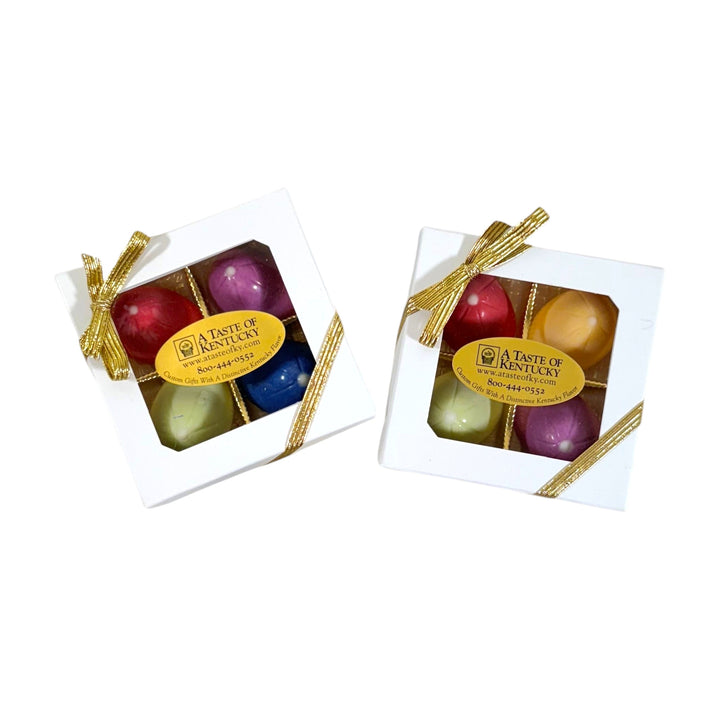 Two boxes of colorful jockey cap chocolate candies with a 'A Taste of Kentucky' label on a white background.