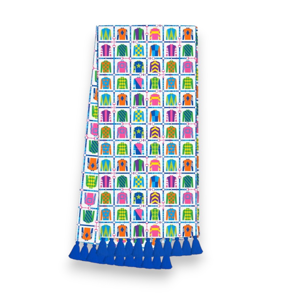 White cotton tea towel with colorful jockey silks and bridle patterns.