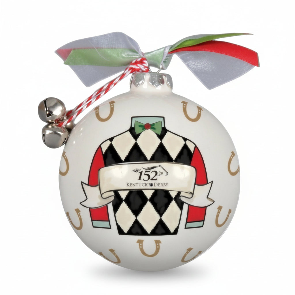 Close-up of the Jockey Silk ornament featuring a colorful silk design and golden horseshoe pattern background.