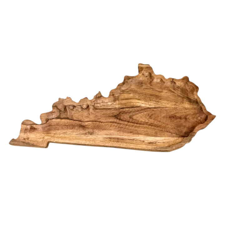 Wooden cutting board shaped like the state of Kentucky on a white background