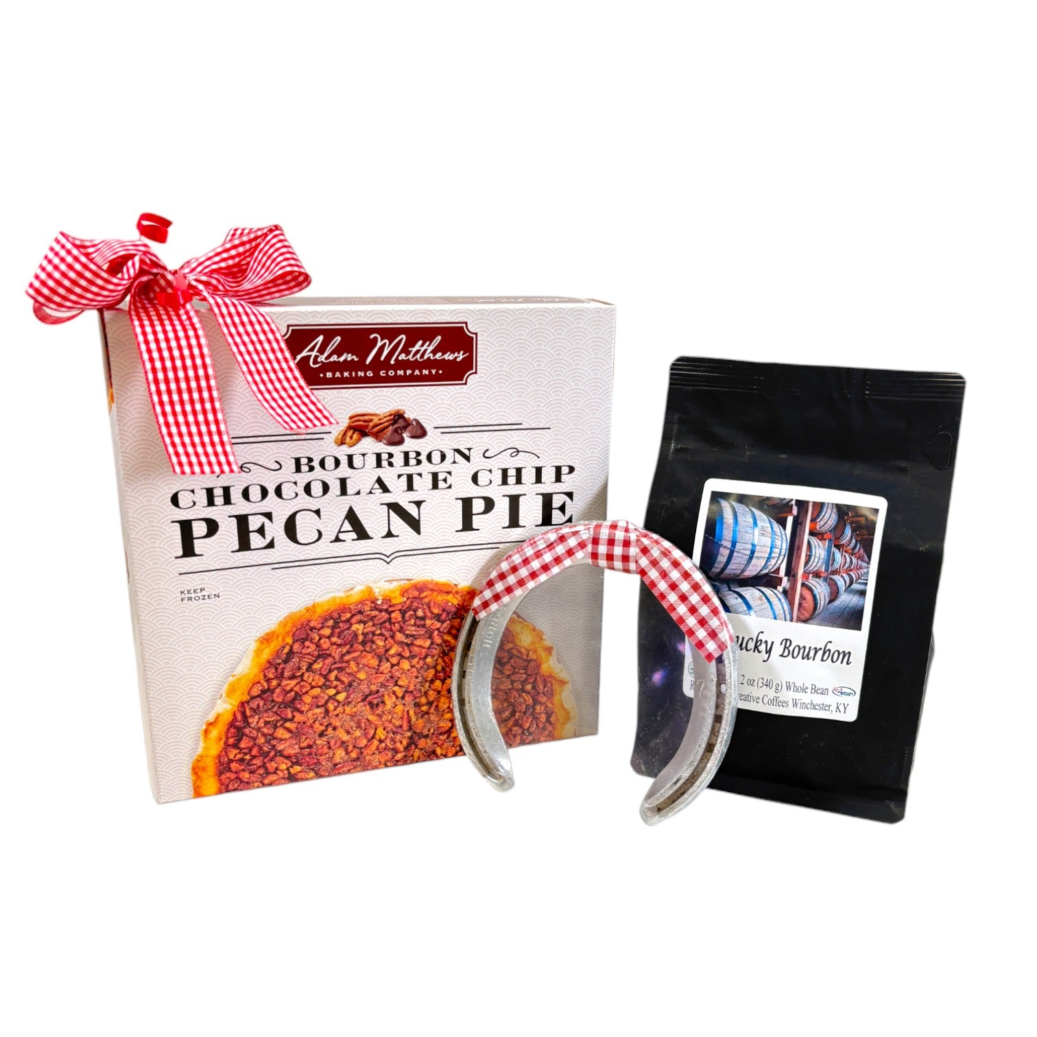 The Kentucky Bourbon Pecan Pie Gift Box, featuring a whole pie, a bag of bourbon whole bean coffee, and a horseshoe.