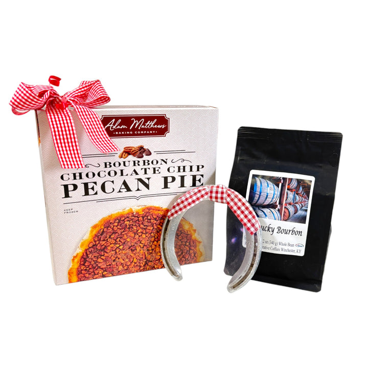 The Kentucky Bourbon Pecan Pie Gift Box, featuring a whole pie, a bag of bourbon whole bean coffee, and a horseshoe.