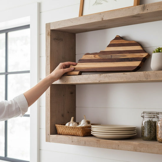 Handmade Kentucky charcuterie board displayed in a rustic farmhouse kitchen as functional wooden décor.
