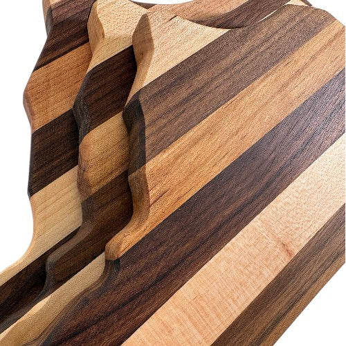  Close-up detail of the natural wood grain and handcrafted finish on the Kentucky charcuterie board.