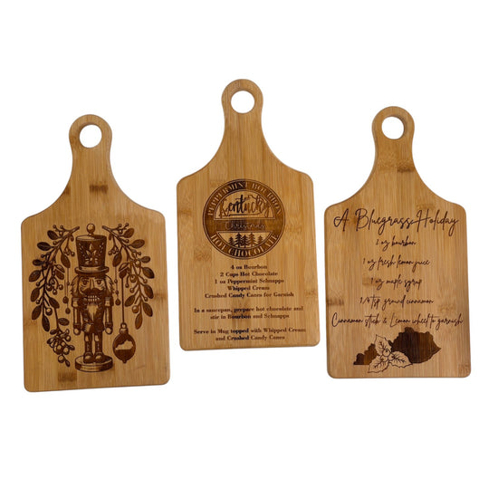 A side-by-side view of the Nutcracker, Kentucky Hot Chocolate, and Bluegrass Holiday board designs.