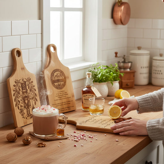 Person preparing a drink on a kitchen counter with hot chocolate, lemons, and wooden cutting boards.