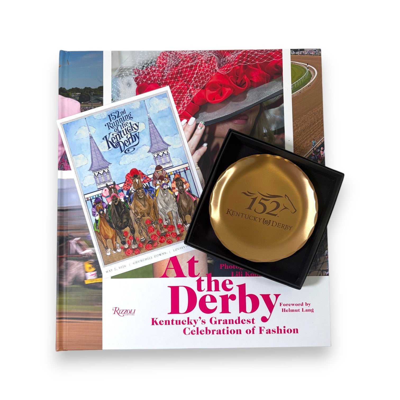 Kentucky Derby 152 Keepsake Bundle featuring the At the Derby Rizzoli coffee table book, official 152nd bronze coaster, and Art of the Derby postcard