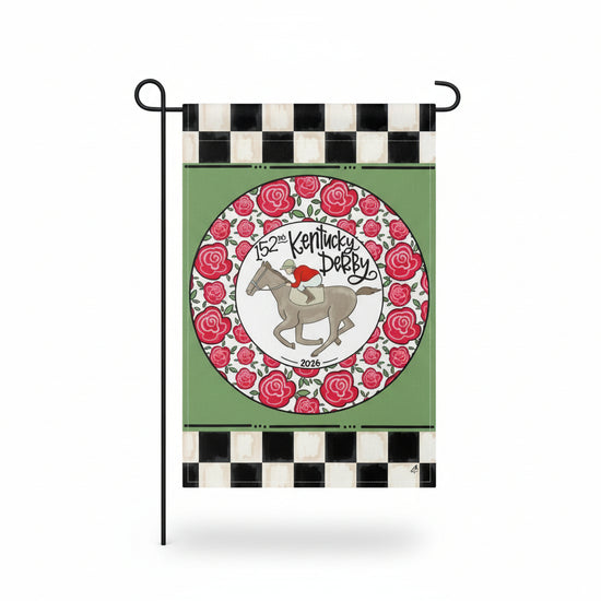The 152nd Kentucky Derby Ring of Roses garden flag displayed on a stand, showing the checkered border and central horse and jockey emblem.