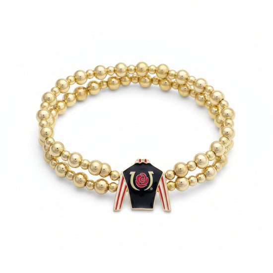 Full view of the Kentucky Derby two-row gold bead stretch bracelet, showcasing the black, red, and white jockey silk enamel charm.