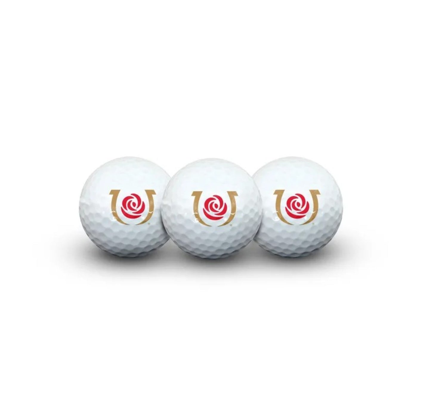 Three golf balls with the Kentucky Derby logos on a white background