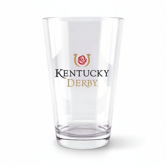 A clear 16 oz pint glass featuring the official Kentucky Derby logo and artwork centered on the front.