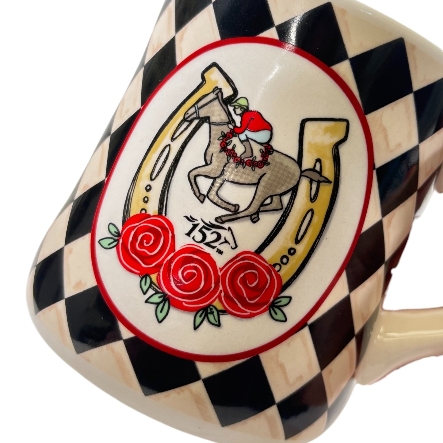A close-up shot of the mug's emblem, showing the detailed horse, jockey, "152" banner, and red roses.