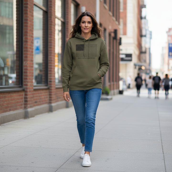 A model wearing the military green Kentucky Derby 152 fleece hoodie in an urban outdoor setting.