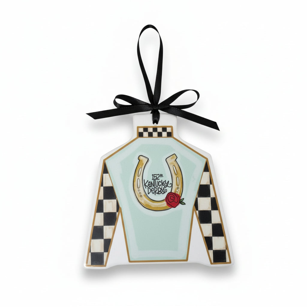 The 5" x 5" flat ceramic Kentucky Derby ornament shaped like a jockey silk with a black hanging ribbon.
