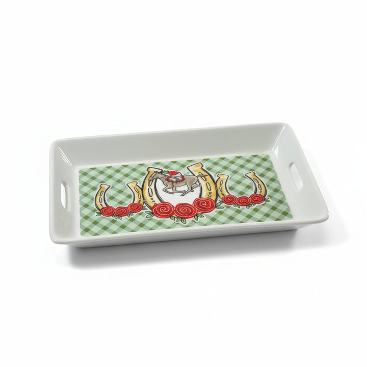 A white rectangular mini tray featuring a green gingham pattern, three horseshoes accented with red roses, and a galloping horse with jockey in the center horseshoe.