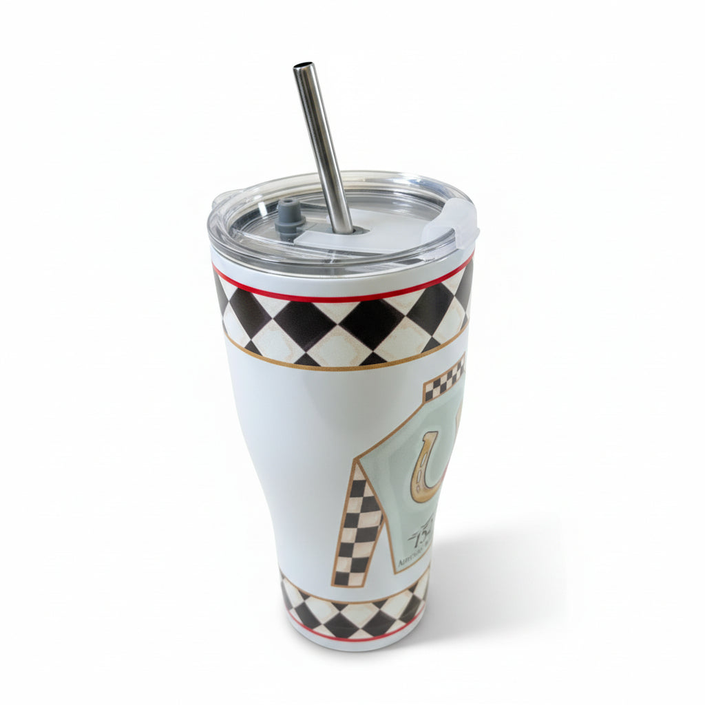 A close-up of the stainless steel tumbler, showing the clear lid, metal straw, and detailed black and white checkerboard pattern.