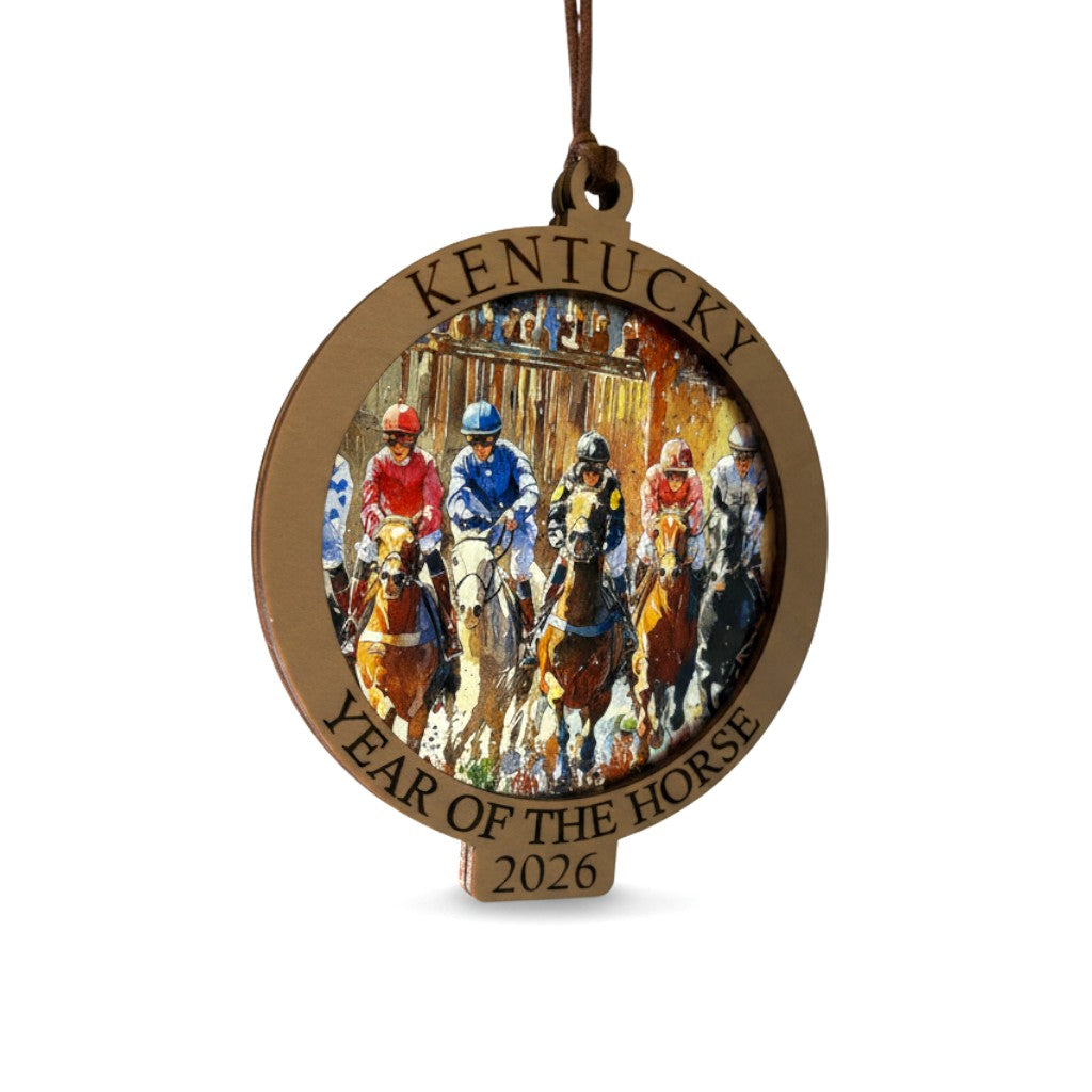 Decorative ornament with horse racing design and 'Kentucky Year of the Horse 2026' text on a white background