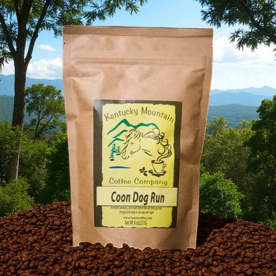 Kentucky Mountain Coffee Company Coon Dog Run coffee package with a scenic background