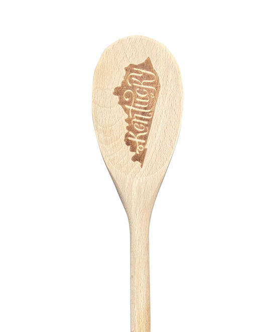 Wooden spoon with engraved logo on a white background