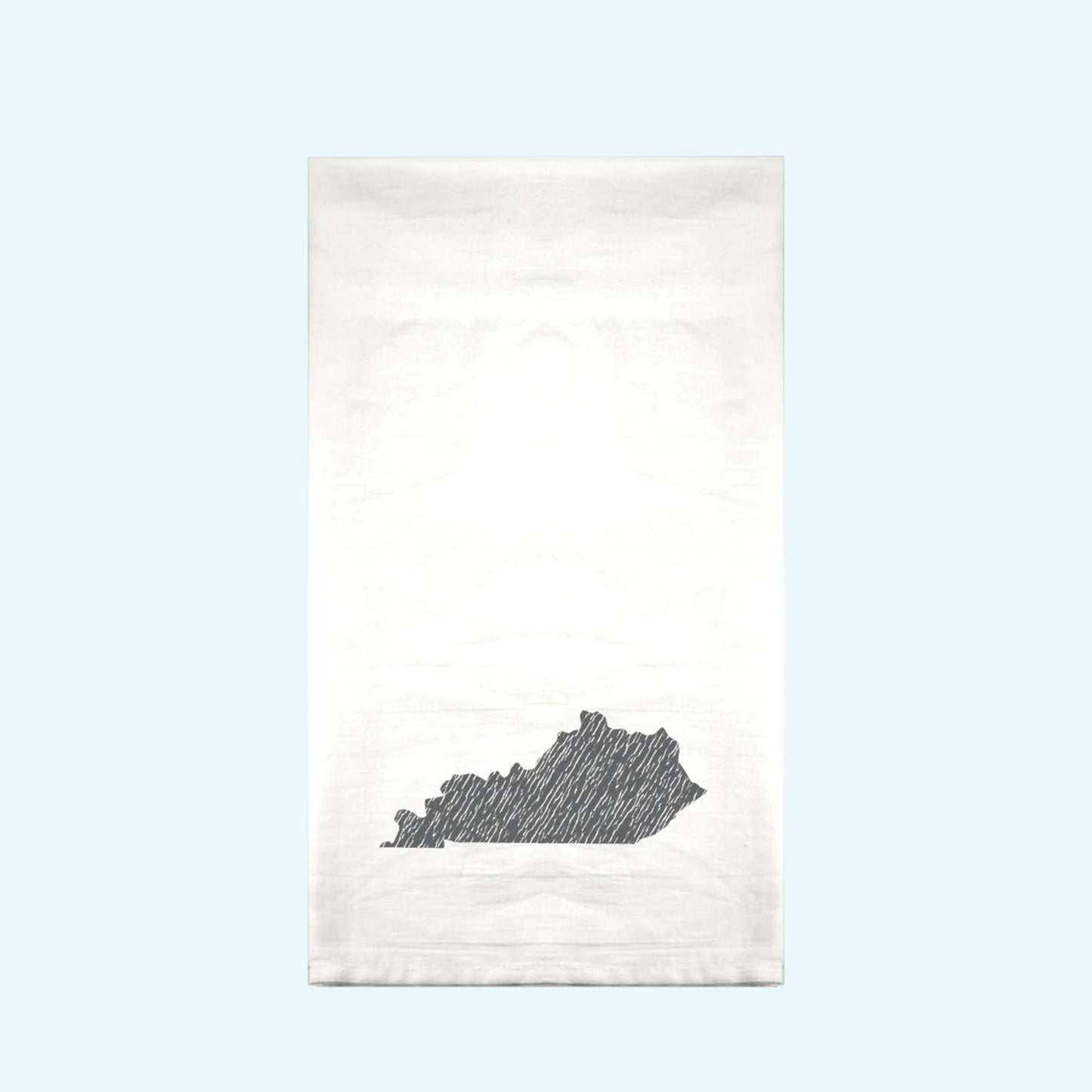 White towel with black state outline design on a gradient background