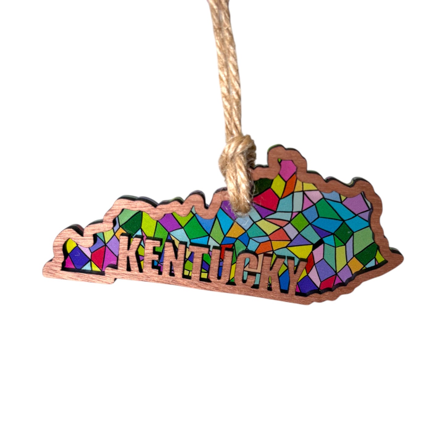 Colorful stained glass-style Kentucky-shaped ornament on a white background