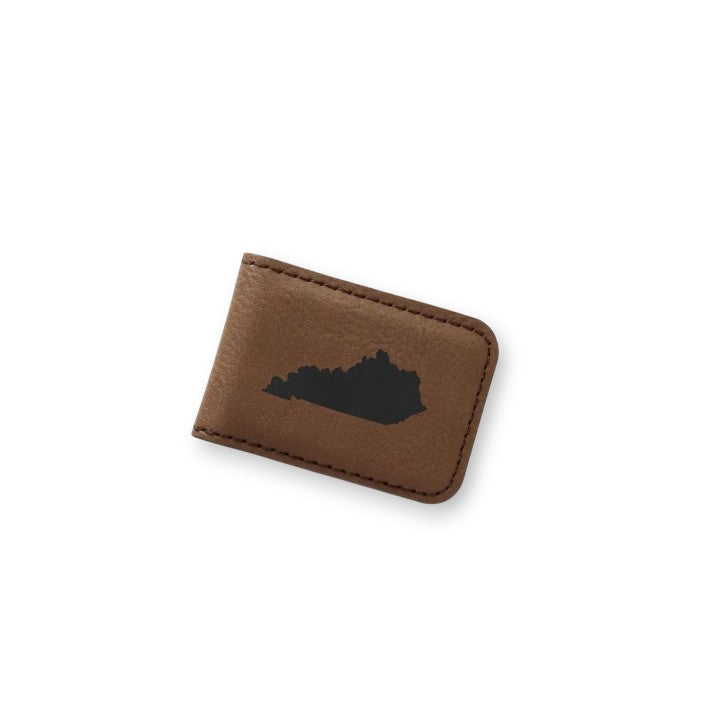 A close-up of the brown faux leather money clip featuring a laser-engraved Kentucky state outline.
