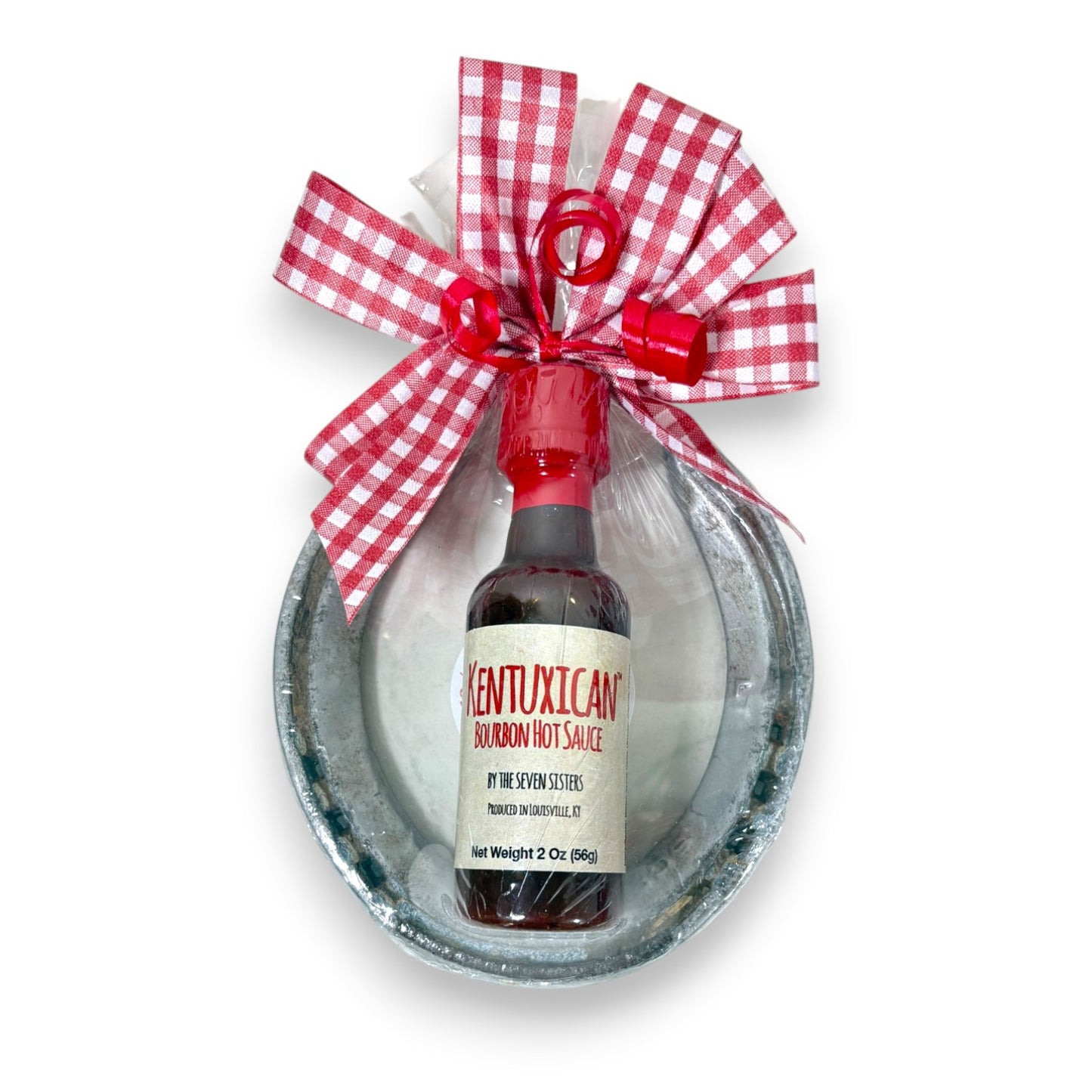 Genuine track horseshoe Derby party favor paired with a mini 2 oz bottle of Kentucky bourbon hot sauce, finished with a handmade gingham bow.