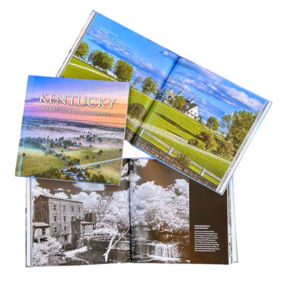 Interior spread displaying a black and white photograph of the historic Weisenberger Mill beside a flowing creek.