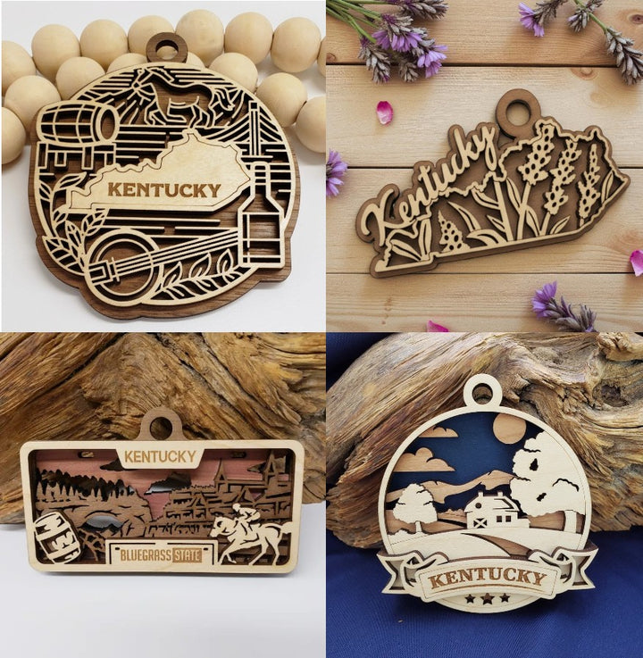 A flat lay of all four unique Kentucky laser-cut wood ornaments arranged together.