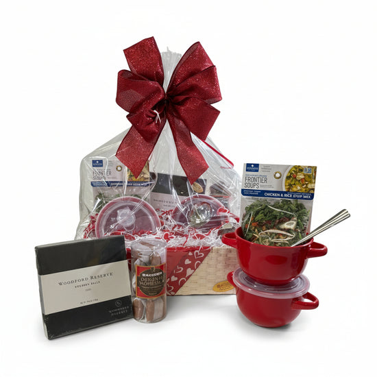  The Let's Stay In Basket featuring soup bowls, spoons, mix, and Kentucky sweets beautifully arranged.